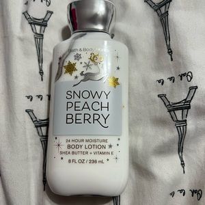 Bath and body snowy peach berry lotion